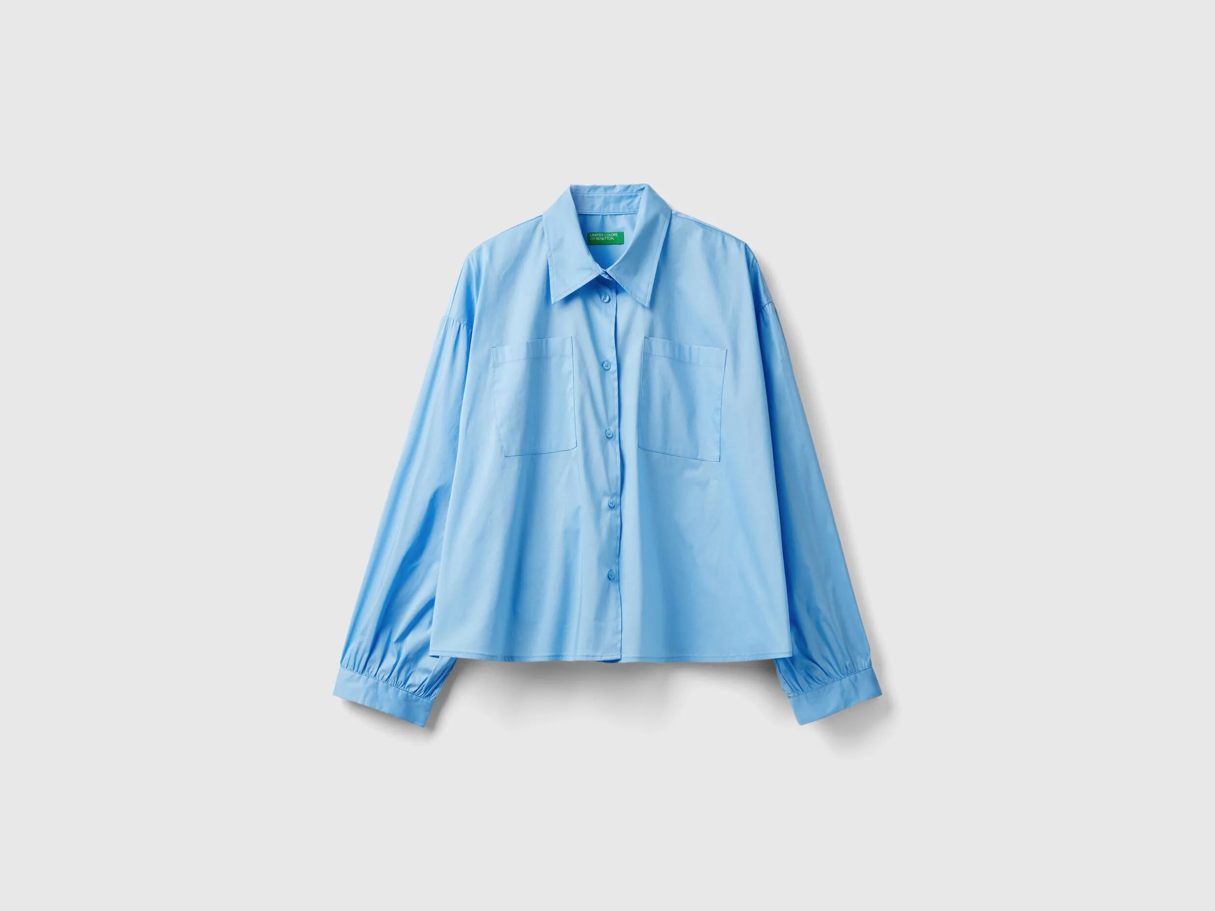 Camisa boxy fit con mangas abullonadas