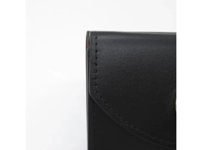 Cartera de cuero negro de tres pliegues Christian Louboutin 