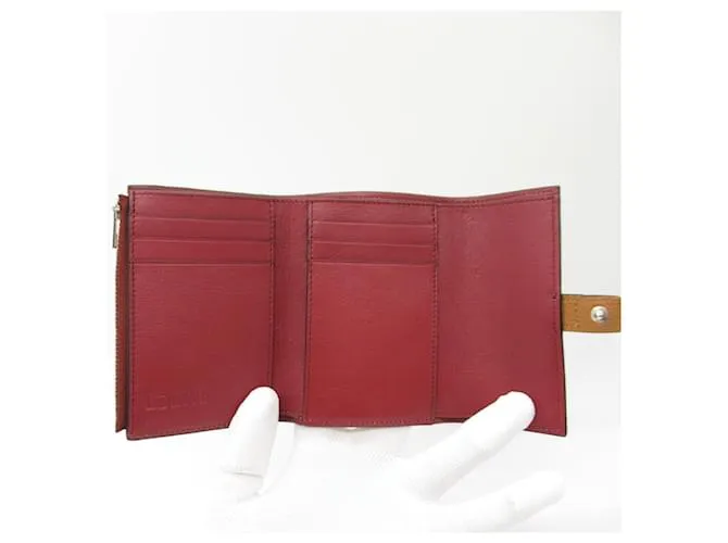 Cartera vertical Loewe pequeña cartera de cuero C660S86X013639 en excelente estado Castaño 