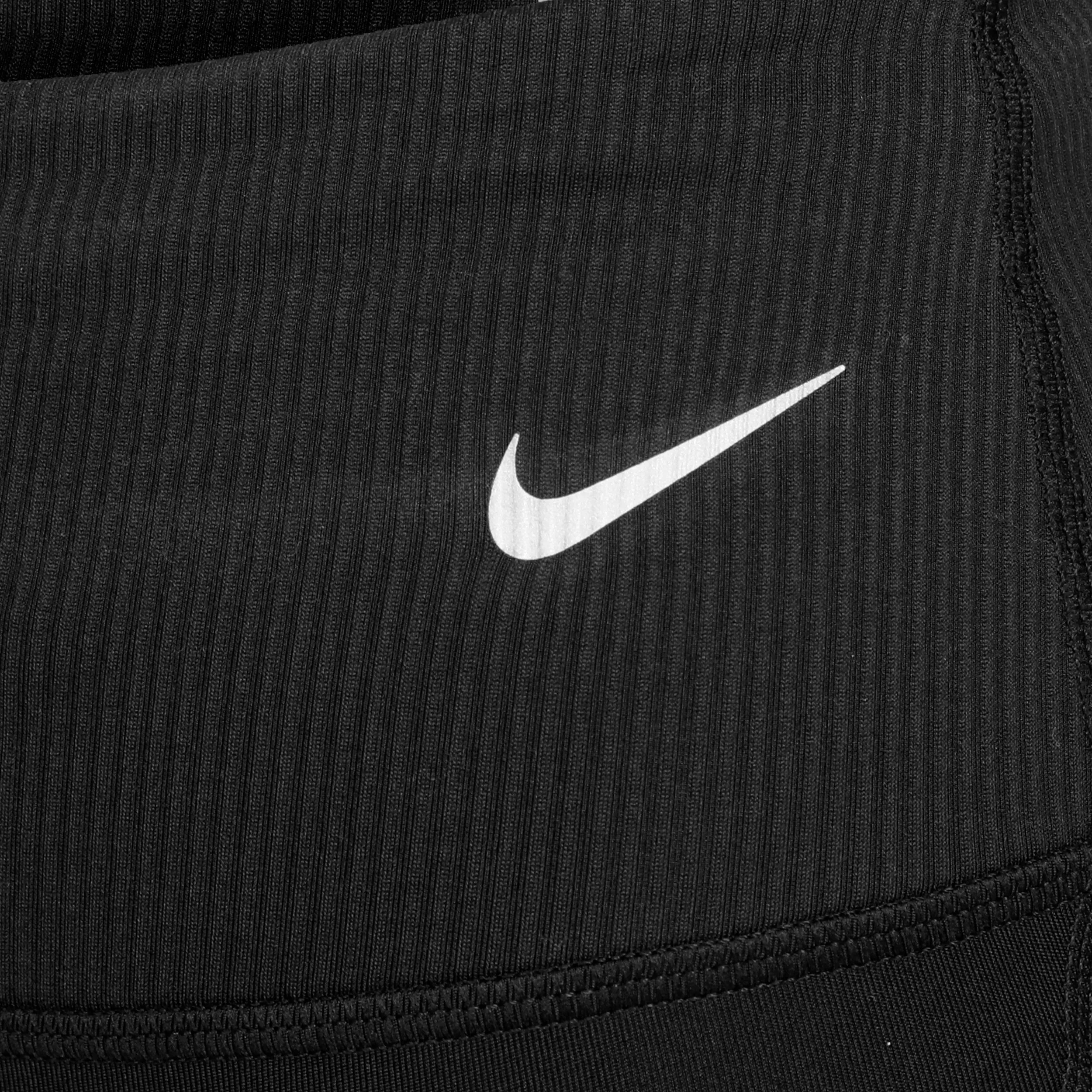 NIKE DRIFIT FAST MIDRISE 7/8 NOVELTY MALLA MUJERES