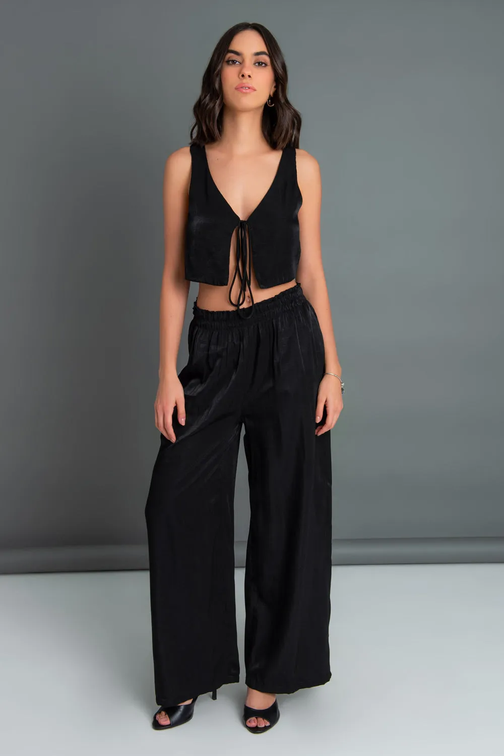 Pantalón fluido fit wide leg cintura alta elástica