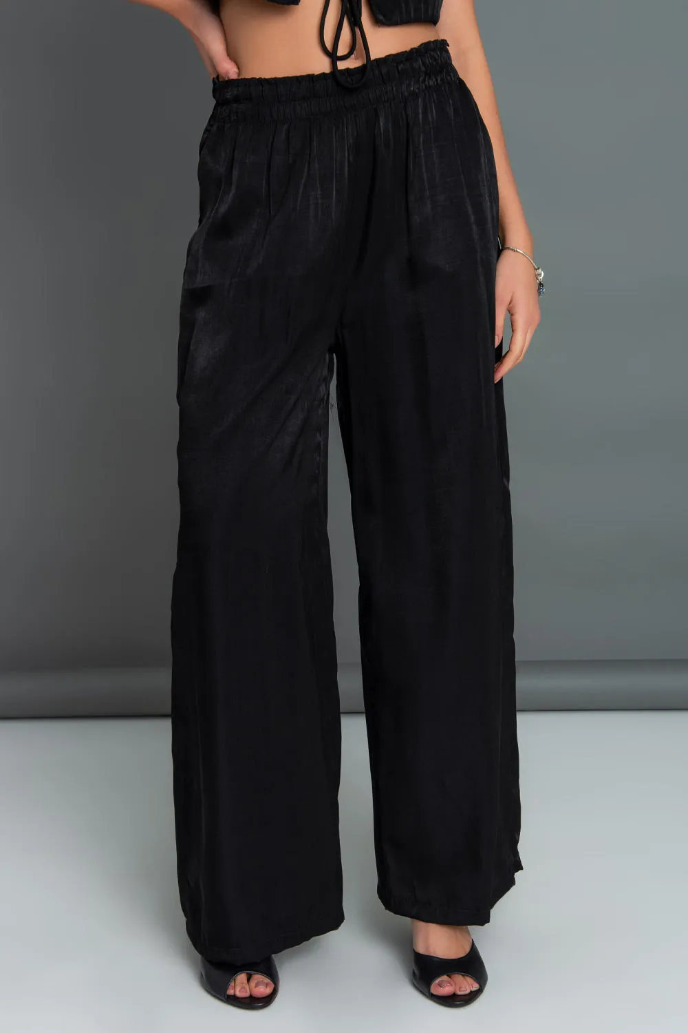 Pantalón fluido fit wide leg cintura alta elástica