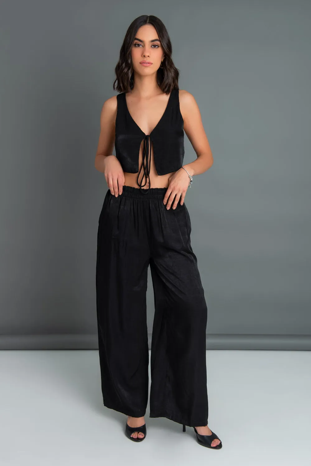 Pantalón fluido fit wide leg cintura alta elástica