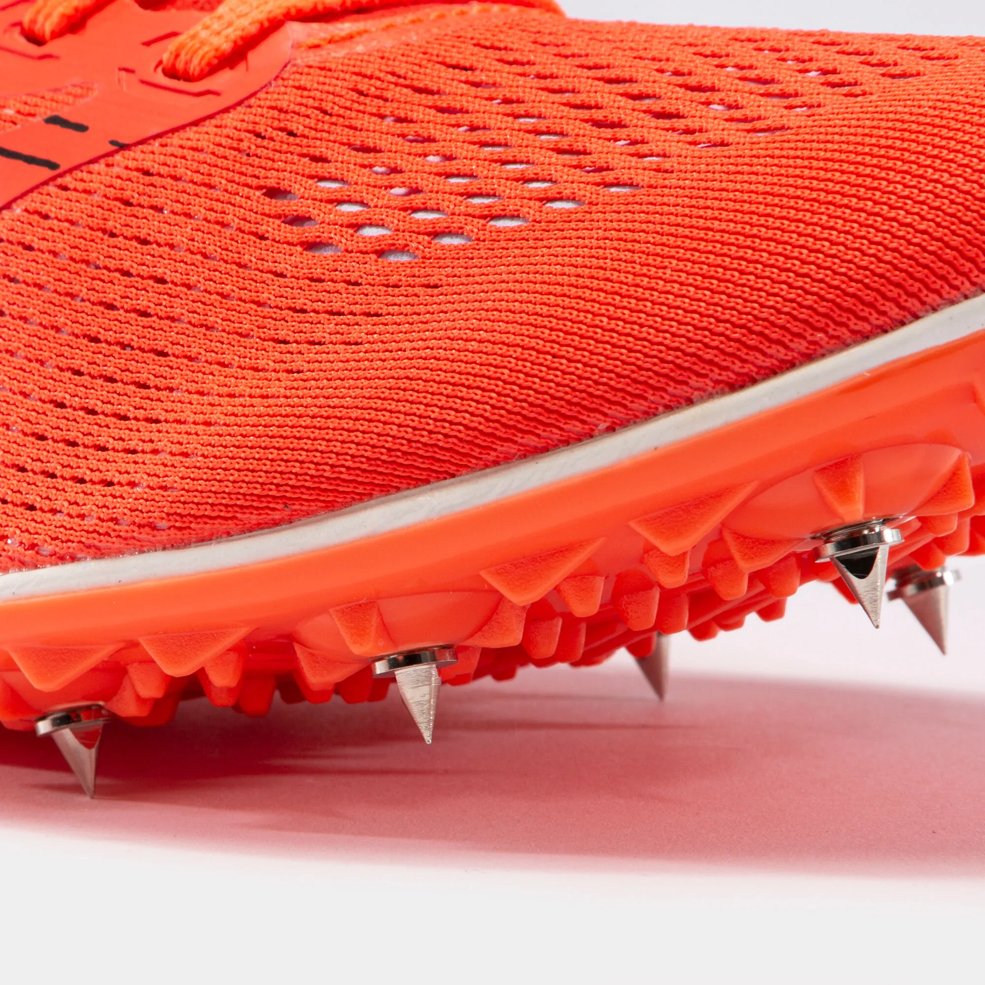 Zapatillas running Flad 21 clavos unisex coral